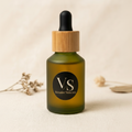 Vonalee Skincare Frankincense Replenishing Face Oil in frosted green glass dropper bottle